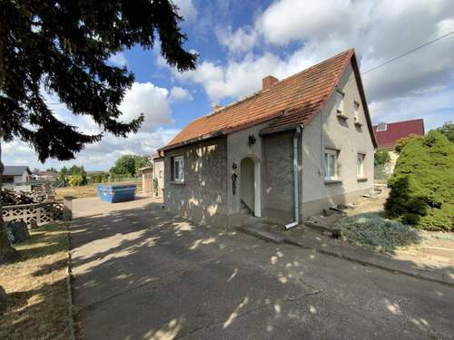 Grundstückszufahrt - Einfamilienhaus mit 95,00 m&sup2; in An der Schmücke zum Kaufen