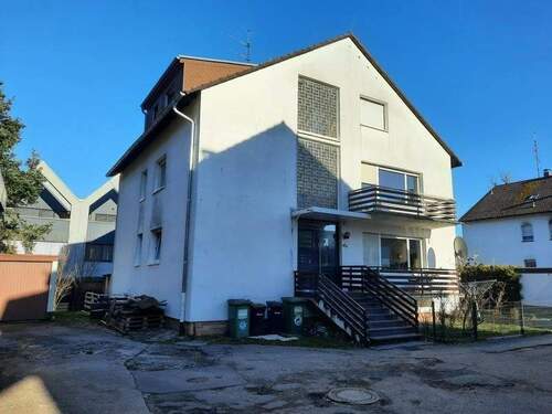 Hauseingangsseite - 3 Zimmer Etagenwohnung zum Kaufen in Dietzenbach