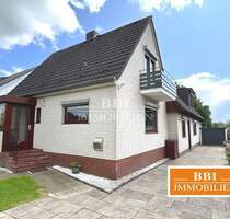 Sehr gepflegtes Einfamilienhaus mit angrenzender Wohnung auf schönem Grundstück in Quickborn-Renzel