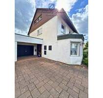 Einfamilienhaus mit Wintergarten, Garage + parkähnlichem Garten - Saarbrücken / Klarenthal