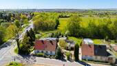 Luftansicht - Für Macher: Kleine Doppelhaushälfte + Garage + Garten + Nebengelass in Ortsrandlage von Aschersleben