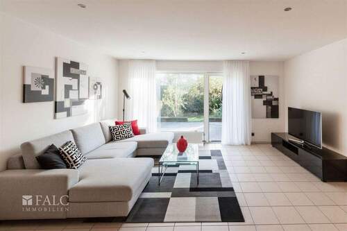 Wohnzimmer mit Gartenausgang - (KI generiert) - 5 Zimmer Mehrfamilienhaus, Wohnhaus in Brüggen