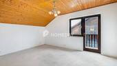 1. OG Schlafzimmer 1 - 