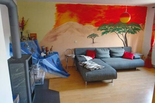 EG - Wohnzimmer mit Kaminofen - 