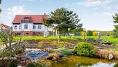 Außenansicht 5 - Wohnen mit Gartenidylle - freistehendes EFH mit Wellnessbad & großzügigem Raumangebot in Seenähe