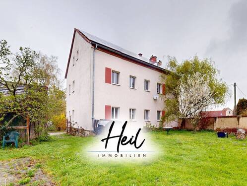 Ansicht - Freistehendes Mehrfamilienhaus mit 2 Wohneinheiten 