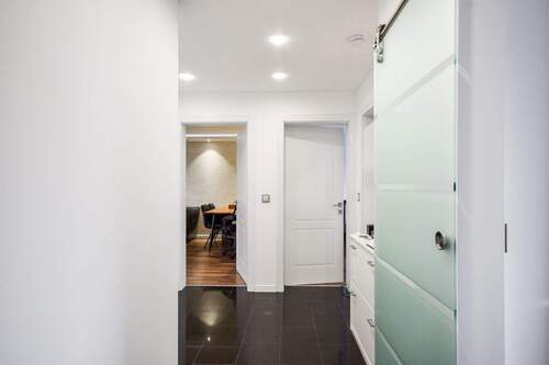 Eingang - AIGNER - Stilvoll sanierte 2-Zimmer-Wohnung in Toplage Kirchheim