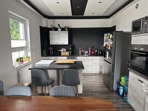 Blick in die Küche Erdgeschoss - 5 Zimmer Einfamilienhaus zum Kaufen in Sohren