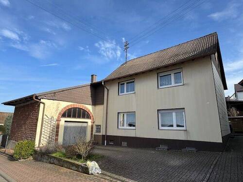 Ihr neues Zuhause - Charmante, freistehende Immobilie mit Werkstatt, Garage und vielseitigem Nebengebäude