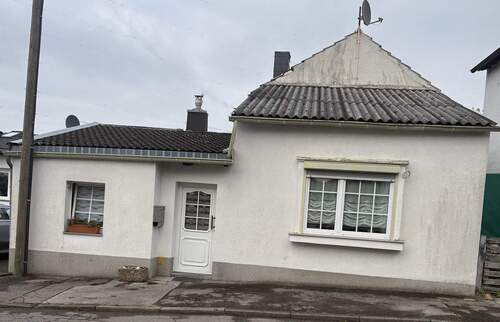Hausansicht - Alternativ zur Eigentumswohnung: Ca. 70 m² Einfamilienhaus mit Garten in Würselen - Bardenberg....