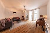 Wohnzimmer - Hochwertig sanierter Altbau-Erstbezug mit Balkon und Designbad in Berlin-Pankow