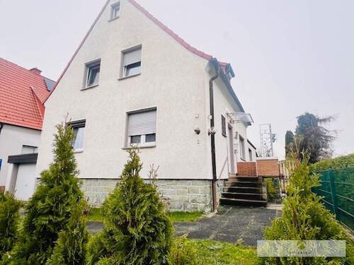 Einfamilienhaus mit Garage + großzügigem Garten - Einfamilienhaus mit Gartenidylle und Ausbaupotential in Werl-Büderich zu verkaufen!