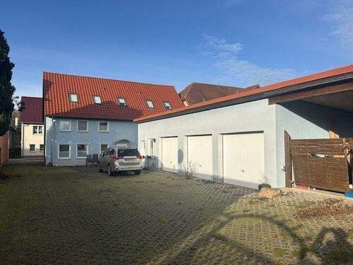 Rückansicht/Garagen - Mehrfamilienhaus, Wohnhaus mit 284,00 m&sup2; in Mirow zum Kaufen