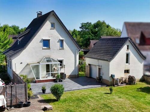 Rückansicht - Mehrfamilienhaus, Wohnhaus mit 120,00 m&sup2; in Minden zum Kaufen