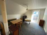 Zimmer im Dachgeschoss - 