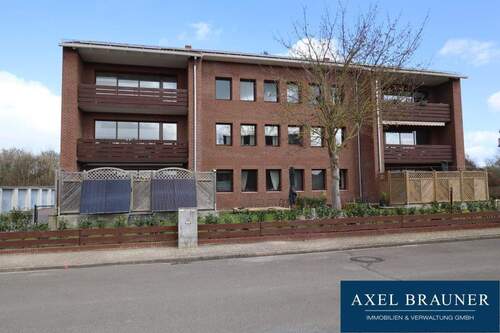 Außenansicht 1 - 4 Zimmer-OG-Wohnung mit Sonnenbalkon im Herzen von Stuhr-Brinkum