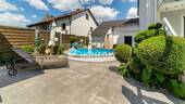 Terrasse 3 - Gepflegte Doppelhaushälfte mit Pool, Doppelgarage und vielseitigem Platzangebot