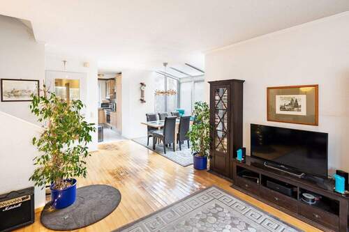 Wohnzimmer mit Wintergarten - Reihenendhaus mit 145,00 m&sup2; in Aschheim zum Kaufen