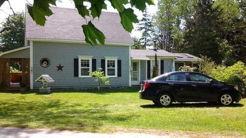 Haus Seitenansicht Parken - Charmantes Haus mit Flair im idyllischen Ort am Meer
