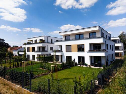 Haus D Süd-Ost Ansicht - 3 - Zimmer Erdgeschosswohnung mit großer Terrasse und Garten - Haus D, Wohnung 4.2