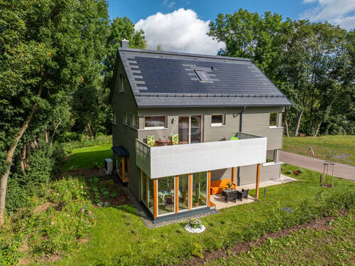 Seitenansicht Musterhaus - Einfamilienhaus mit 110,40 m² in Gotha zum Kaufen