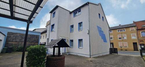 MFH Seitlich - Zwei Häuser, ein Gedanke: hier wohnen & gleichzeitig investieren