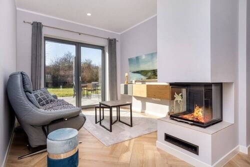 8. Urgemütlich! Wohnen mit Kaminecke und Gartenzug - 