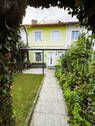 Vorderseite Haus - Reihenmittelhaus mit Garage - 770.000,00 EUR Kaufpreis, ca.  80,00 m² Wohnfläche