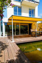 Terrasse und Teich - 5 Zimmer Doppelhaushälfte in München