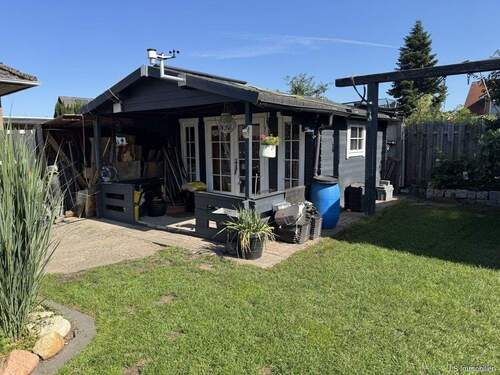 Gartenhaus - 8 Zimmer Einfamilienhaus in Wiefelstede / Ofenerfeld