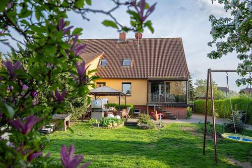Garten mit Blick auf´s Haus - 1 Zimmer Einfamilienhaus in Rätzlingen