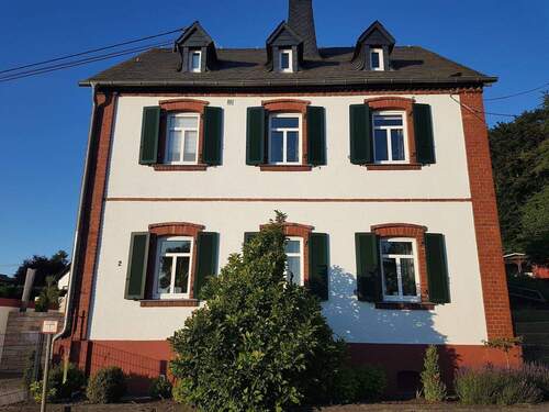 Ansicht Haus Seite - 4 Zimmer Einfamilienhaus in Dreikirchen