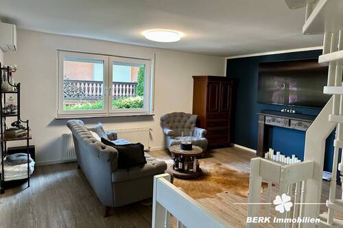 Wohnzimmer EG - 5 Zimmer Doppelhaushälfte in Heigenbrücken