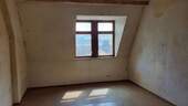 Zimmer im Dachgeschoss - 
