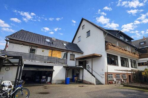Gasthof mit 11 Wohneinheiten - 1 Zimmer Mehrfamilienhaus, Wohnhaus zum Kaufen in Heigenbrücken