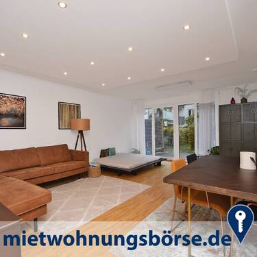 Wohnraum - AIGNER - Großzügig und Modern: 3-Zimmer Gartenwohnung in Obergiesing