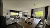 Wohnzimmer mit Essbereich - Exklusive Eigentumswohnung mit Panoramaausblick