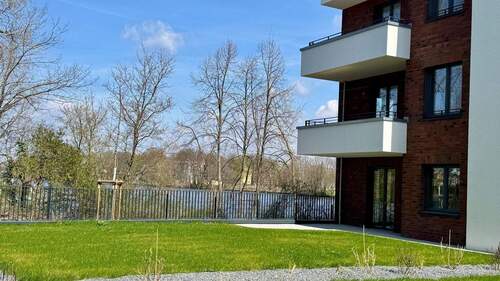Garten mit Wasserblick - Traumhafte 3-Zi-Neubauwohnung mit Garten direkt am Wasser (Erstbezug)!