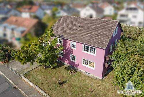 Bild 2 - 9 Zimmer Mehrfamilienhaus, Wohnhaus zum Kaufen in Külsheim