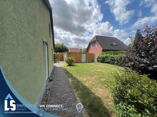 Seitenansicht aus dem Garten - Bungalow mit 102,00 m&sup2; in Halberstadt zum Kaufen