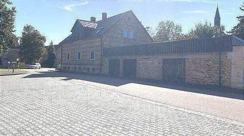 Außenansicht mit Garagen - 6 Zimmer Einfamilienhaus in Seegebiet Mansfelder Land