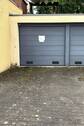 Garage mit Stellplatz davor - 