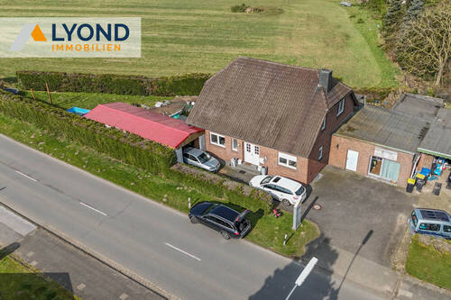 LYD 3641 - 1 Außenansicht - Attraktives Einfamilienhaus mit Gewerbefläche und unverbautem Blick im idyllischen Xanten-Vynen