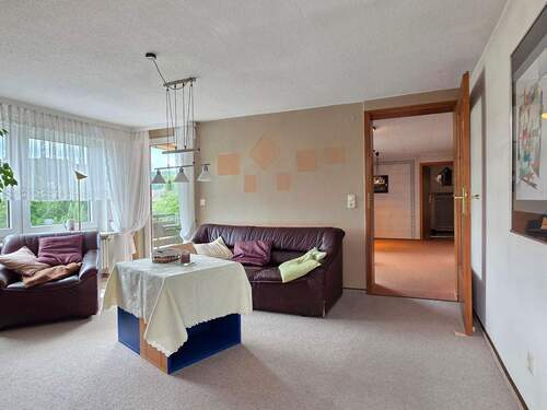 Wohnzimmer mit Balkon - 