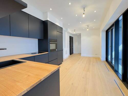 Wohnzimmer andere Sicht mit Zugang zum SZ 2.jpg - 3 Zimmer Etagenwohnung in Sylt