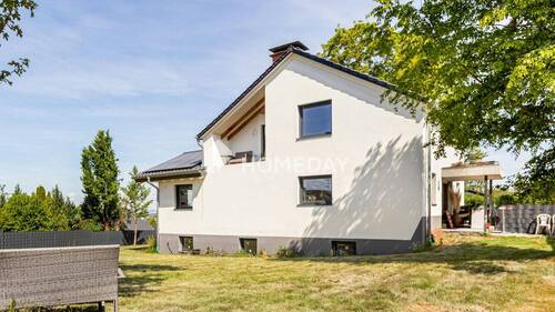 Außenansicht 2 - Modernisiertes Einfamilienhaus mit großzügigem Wohnkomfort und nachhaltiger Technik