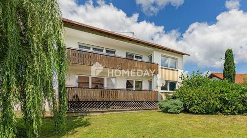 Außenansicht 3 - Gepflegtes 2-Familienhaus mit Ausbaureserve im DG und großzügigem Garten