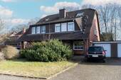 Ansicht - Schönes 5-Zi.-Zuhause mit Garten, einer Garage und 2 Freistellplätzen in ruhigem Wendehammer