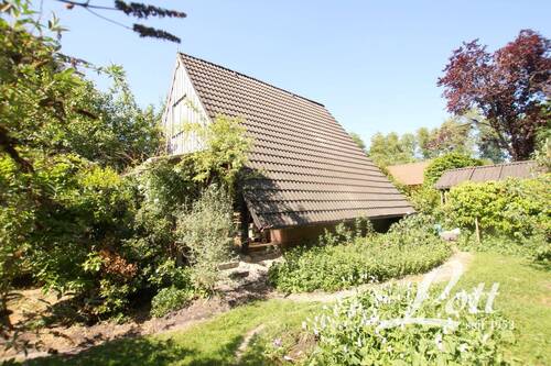 Bild 4 - Mehrfamilienhaus, Wohnhaus mit 55,80 m² in Westerstede / Karlshof zum Kaufen