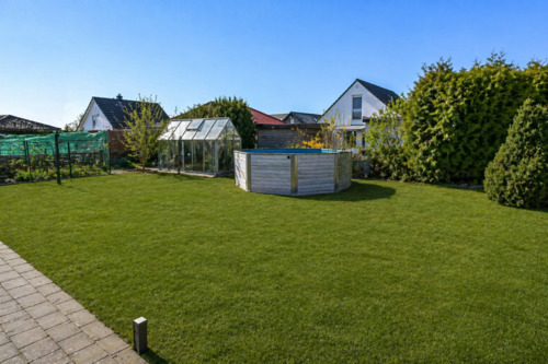 Garten (KI bearbeitet) - Einfamilienhaus mit 172,00 m&sup2; in Wolfsburg zum Kaufen